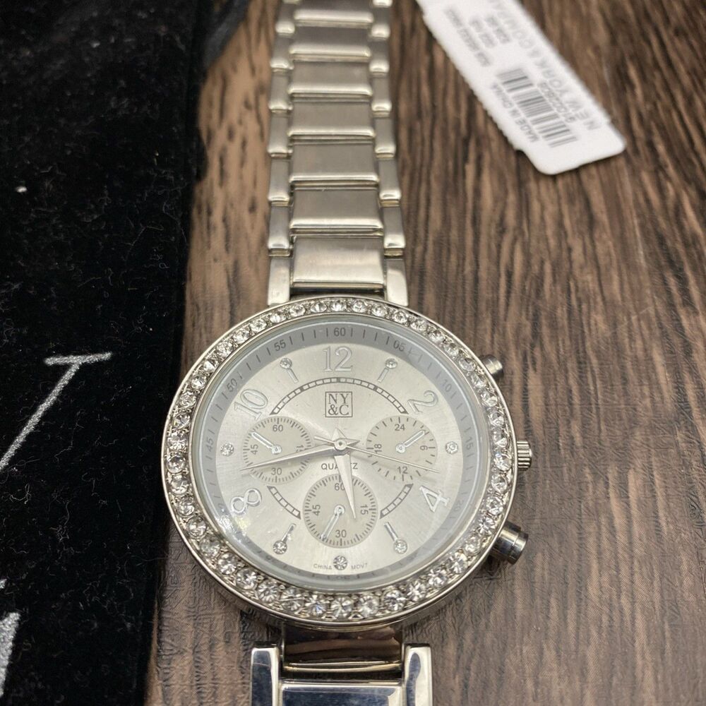 New York & Company Womens Silver Tone Crystal Bezel Watch working